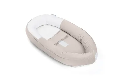 Produktbild von Doomoo Cocoon Babynestchen für Neugeborene – schafft eine sichere und geborgene Schlafumgebung in Beige