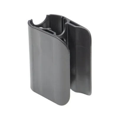 A gray plastic clip for a vacuum cleaner accessory holder.