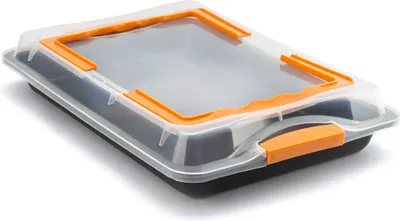 A baking pan with a transparent lid and orange handles, shown from a slightly elevated angle on a white background.