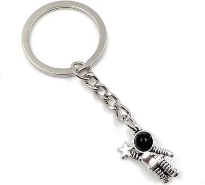 Produktbild von Onwomania Schlüsselanhänger - "Astronaut Stern Weltall" - Metall Glücksbringer ideal als Geschenk z.B. für den besten Freund, die beste Freundin, Mama