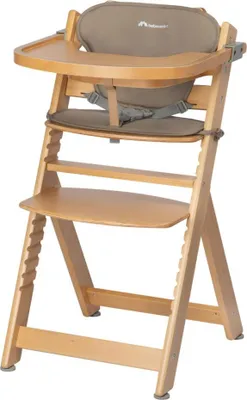 A wooden high chair with a beige cushion and harness, shown from the front.