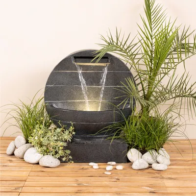 Produktbild von Brunnen - Gartenbrunnen mit Wasserfall - Polyresin - 6 warmweiße LED - H: 59cm - anthrazit