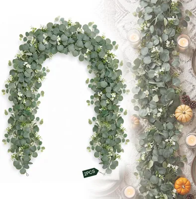 Imagen del producto de Enredaderas de eucalipto artificiales, de 1,8 metros de largo, color verde con flores blancas, lote de 2 unidades, ideales para decoración de interiores y eventos