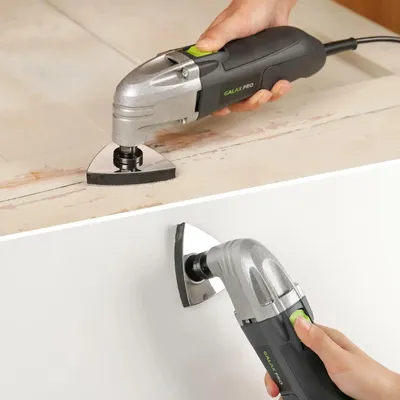 Produktbild von Multifunktionswerkzeug oszillierend - Multitool 180 W - 22000 OPM - 3° Schwingwinkel - 3 Sägeblätter + Schleifplatte + 6 Schleifpapiere - Grün