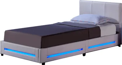 A white bed with blue LED lighting and storage drawers.