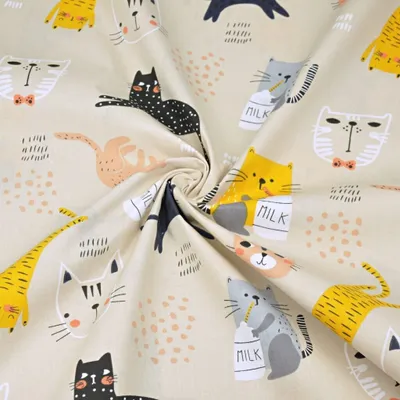 Produktbild von Baumwolle 100% orange Katzen auf beige Hintergrund