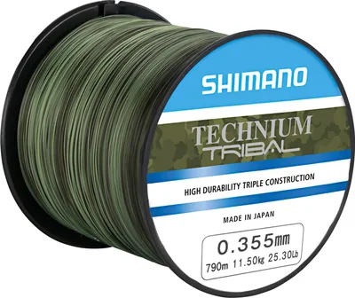 A spool of fishing line with camouflage pattern on a white background.