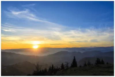 Produktbild von Wallario Wandbild aus Acryl, 90 x 60 cm, freischwebende Optik - Sonnenaufgang über dem Schwarzwald