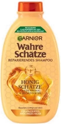 Produktbild von Garnier Wahre Schätze Honig Schätze Shampoo, Shampoo mit Propolis und Bienenmilch, für strapaziertes Haar, 250 ml