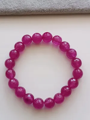 Produktbild von ROSA ARMBAND AUF EINEM ELASTISCHEN BAND MIT EINEM FACETTIERTEN JADEITSTEIN 10 mm