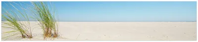 Produktbild von Wallario Küchenrückwand aus Glas, Größe: 250 x 50 cm, Motiv: Sandstrand unter blauem Himmel | Spritzschutz | abwischbar | pflegeleicht | in