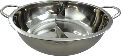 A stainless steel hot pot with two compartments.