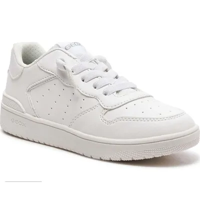 A studio shot of a single white sneaker.