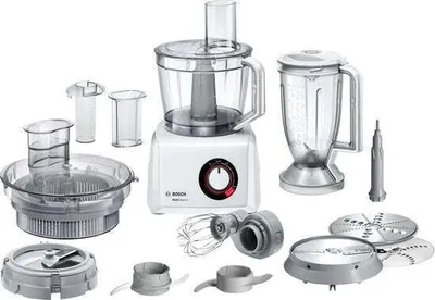 A collection of food processor attachments and the main unit are displayed against a white background.