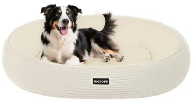 Image de Lit rond en velours pour chiens et chats avec fond antidérapant
