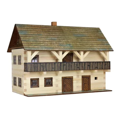 A model of a wooden house with a balcony and a tiled roof.