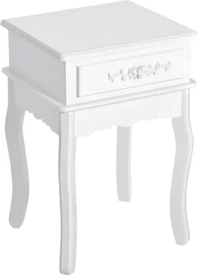 A white wooden nightstand with one drawer and decorative carving on the drawer front, shown against a white background.