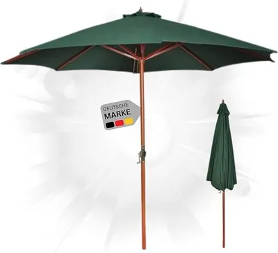 A green patio umbrella is shown open, with a smaller, closed umbrella to the right. A German flag badge with the text 'DEUTSCHE MARKE' is attached to the pole of the open umbrella.