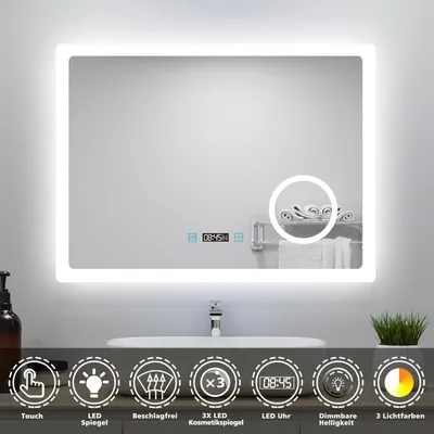 A modern LED bathroom mirror with integrated features displayed above a sink.