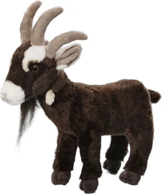 A stuffed toy goat is shown standing against a white background.
