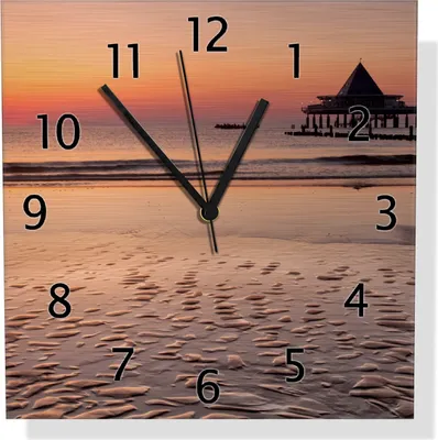 Produktbild von Wallario Design Wanduhr Strand am Abend - Seebrücke am Ostseebad Heringsdorf aus Aluverbund, Größe 30 x 30 cm