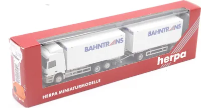 Produktbild von Herpa 144155 Mercedes-Benz Actros L Wechslekoffer-Hängezug "Bahntrans" 1:87 in