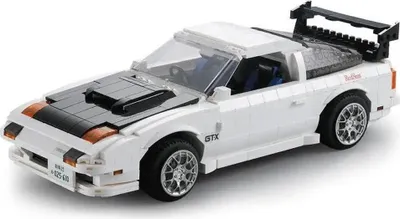 A white Lego-style model of a Mazda FC3S RX-7 sports car is shown against a white background.