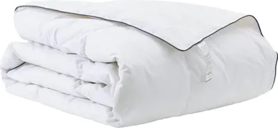A folded white winter duvet with a dark trim, presented against a white background.
