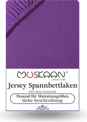 A close-up of a purple fitted sheet with a label at the bottom.