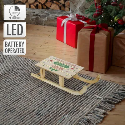 Obrázok produktu pre ECD Germany LED dekoratívne drevené sane s teplými bielymi LED diódami, 42x16 cm, prírodná hnedá farba, napájané batériami, osvetlené dekoratívne sane s časovačom