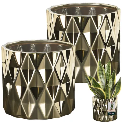 Two gold ceramic planters with a geometric pattern are shown on a white background, with a smaller planter containing a snake plant in the foreground.