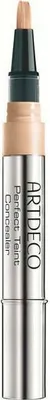 A close-up studio shot of an Artdeco Perfect Teint Concealer.