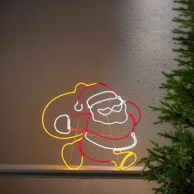 Zdjęcie produktu dla Dekoracja świąteczna Św. Mikołaj z Workiem 2D NEON LED 71 cm wysokości