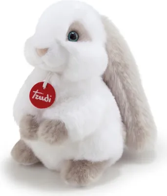 A white and gray plush bunny toy with blue eyes and a red tag.