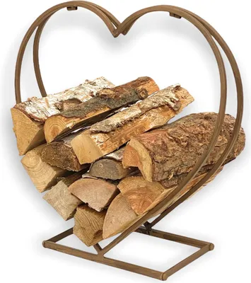 A heart-shaped metal log holder filled with firewood, presented against a white background.