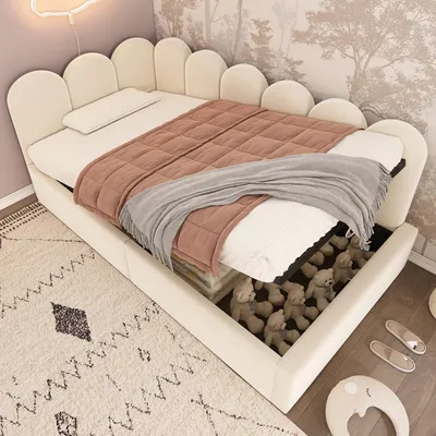 A child's bed with storage, featuring a scalloped headboard and a pink blanket.