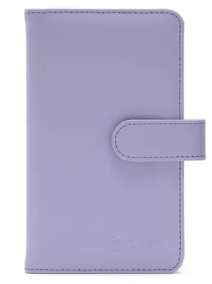 A lilac-purple Instax Mini album is shown against a white background.