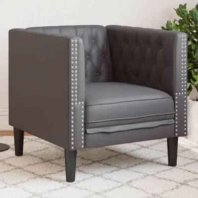Immagine prodotto di Poltrona Chesterfield in ecopelle grigia, dal design classico con cuciture a bottone e braccioli imbottiti