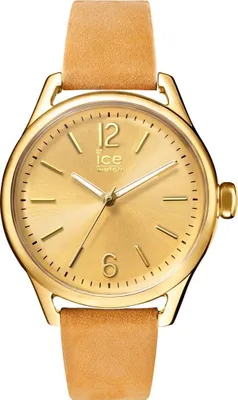 A close-up studio shot of a gold analog watch with a tan leather strap.
