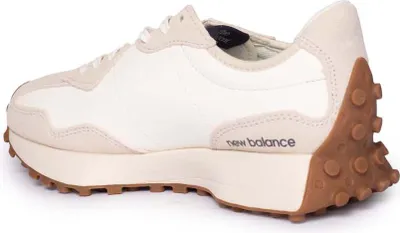 Side view of a New Balance sneaker.