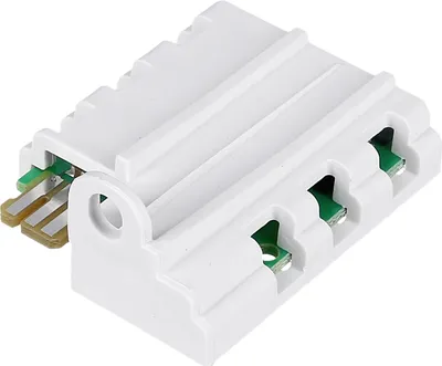 A white electronic component with gold and green connectors.