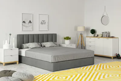 A bedroom scene with a bed, nightstands, and a dresser.