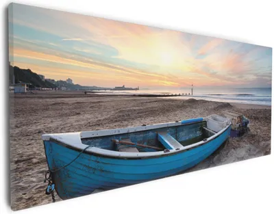 Produktbild von Wallario Premium Leinwandbild Fischerboot am Strand bei Sonnenuntergang in Größe 30 x 75 cm