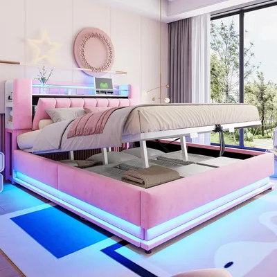 A pink upholstered bed with storage and LED lighting in a bedroom setting.