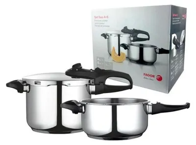 Two Fagor Duo pressure cookers are displayed in front of their packaging.