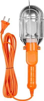 A work light with an orange cord and plug, and a silver cage around the bulb housing.