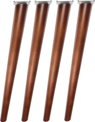 Four wooden furniture legs with silver tops are arranged vertically against a white background.