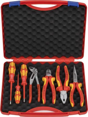 A red tool case with a black foam interior, containing a set of electrical tools.