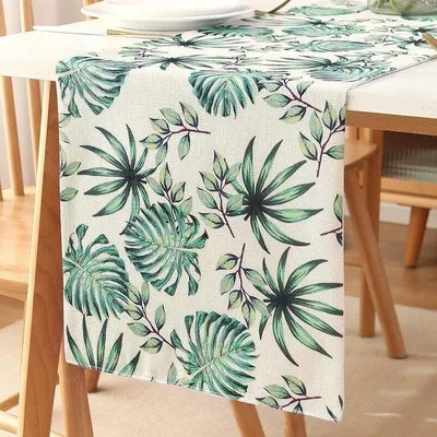 Imagen del producto de Mantel individual Unyqoos® de lino con estampado de hojas verdes, 33 x 183 cm – ideal para decorar mesas de comedor, salones, aparadores y mesas de celebraciones