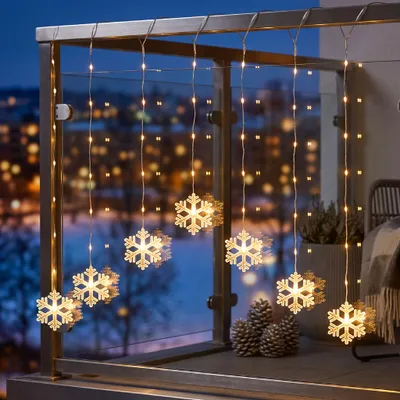 Produktbild von LED Vorhang Schneeflocke mit 47 warmweißen LEDs
